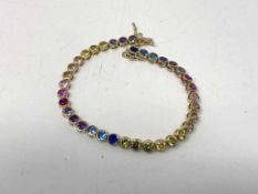 A silver tennis bracelet set with cubic zirconia