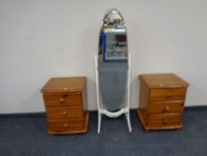 A white cheval mirror.