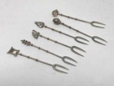 Six silver pickle forks