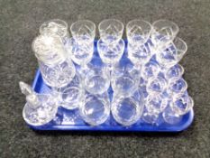 A tray of crystal and glass including storage jars, wine glasses etc.