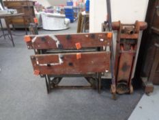 A folding metal work bench together with a trolley jack.