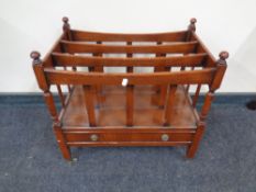 A reproduction mahogany Canterbury.