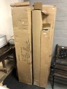 A quantity of boxed electrical light fittings and tubes.