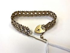 A 9ct gold padlock bracelet CONDITION REPORT: 16.