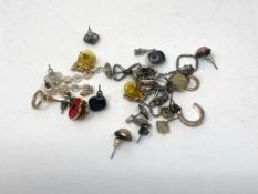 Eleven pairs of earrings, pendant, chain,