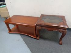 An oriental style coffee table on claw and ball feet and another coffee table