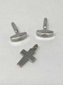 A pair of silver Giorgio Armani cufflinks and cross
