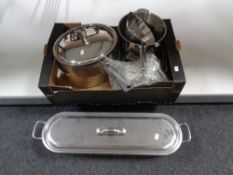 A stainless steel fish kettle together with further stainless steel pans etc.