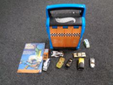 Collection of Hot Wheels, and other cars and race tracks.