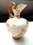 A Royal Worcester blush ivory ewer (height 25cm)