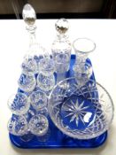 A tray containing a quantity of good quality cut glass lead crystal including decanters,