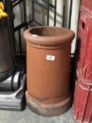 A terracotta chimney pot