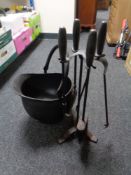 A four piece companion set on stand with a swing handled coal bucket (black)