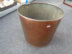 A copper twin-handled pot (diameter 43cm)