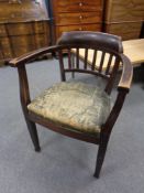 A 19th century stained beech elbow chair