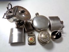 A box containing stainless steel hip flasks, a silver salt with blue glass liner,