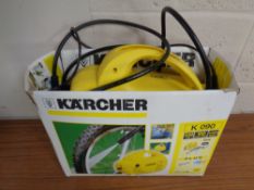A Karcher K 090 pressure washer with hose and attachments (boxed)