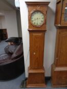 A continental pine longcase clock with painted dial,