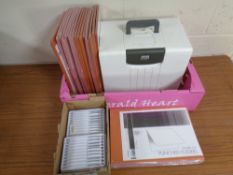 A box containing a metal file box,