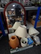 A box containing contemporary table lamps with a dome top mirror