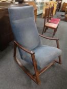 A 20th century beech framed rocking chair