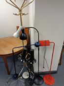 Five 20th century floor lamps with a brass hat and coat stand