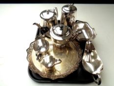 A tray of stainless steel tea set, silver plated circular tray,