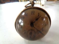 An early 20th century brass bedside clock