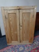A Victorian pine double door kitchen cupboard