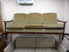 A continental stained beech three seater setee