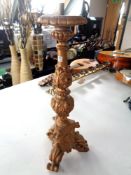 A gilt plaster lamp base