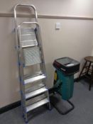 A Bosch garden shredder together with two folding aluminium step ladders