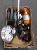 A box containing cordless electric vacuum, extension lead, lithium battery charger with battery,