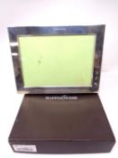 A Mappin & Webb silver photo frame with dedication, in box.