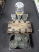 An early 19th century hide upholstered domed box together with a further box containing glass vases,