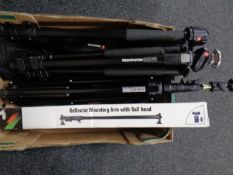 A box containing Manfrotto camera tripod in bag together with Manfrotto camera pole,