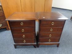 A pair of Stag Minstrel four drawer bedside chests.