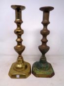 A pair of brass candlesticks