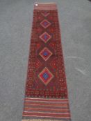 A Meshwani runner 215cm by 57cm