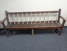 A 19th century pine bench.