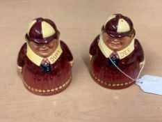 A pair of Royal Doulton salt and pepper pots 'Tweedle Dee & Dum' D7122 & D7121, height 9 cm.