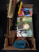 A box of spot lights, power tools,