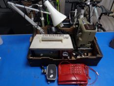 A box containing miscellany to include vintage Hitachi portable TV, angle poise lamp,