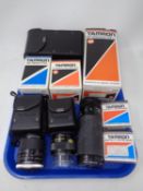A tray containing Tamron camera lenses and accessories including a Tamron 60-300MM F/3.