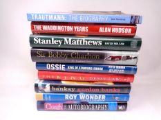 Nine football books bearing signatures including Sir Bobby Charlton, Stanley Matthews,