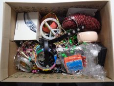 A box containing a quantity of costume jewellery.