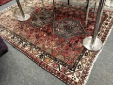 A Khamseh rug, South-West Iran, 199 x 280 cm.