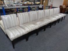 A set of eight contemporary reception chairs upholstered in a faux hide fabric.