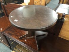 A 20th century circular Bakelite pedestal occasional table