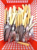A box of silver plated fish cutlery